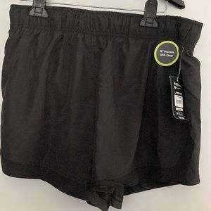 Never worn, 5” inseam running shorts